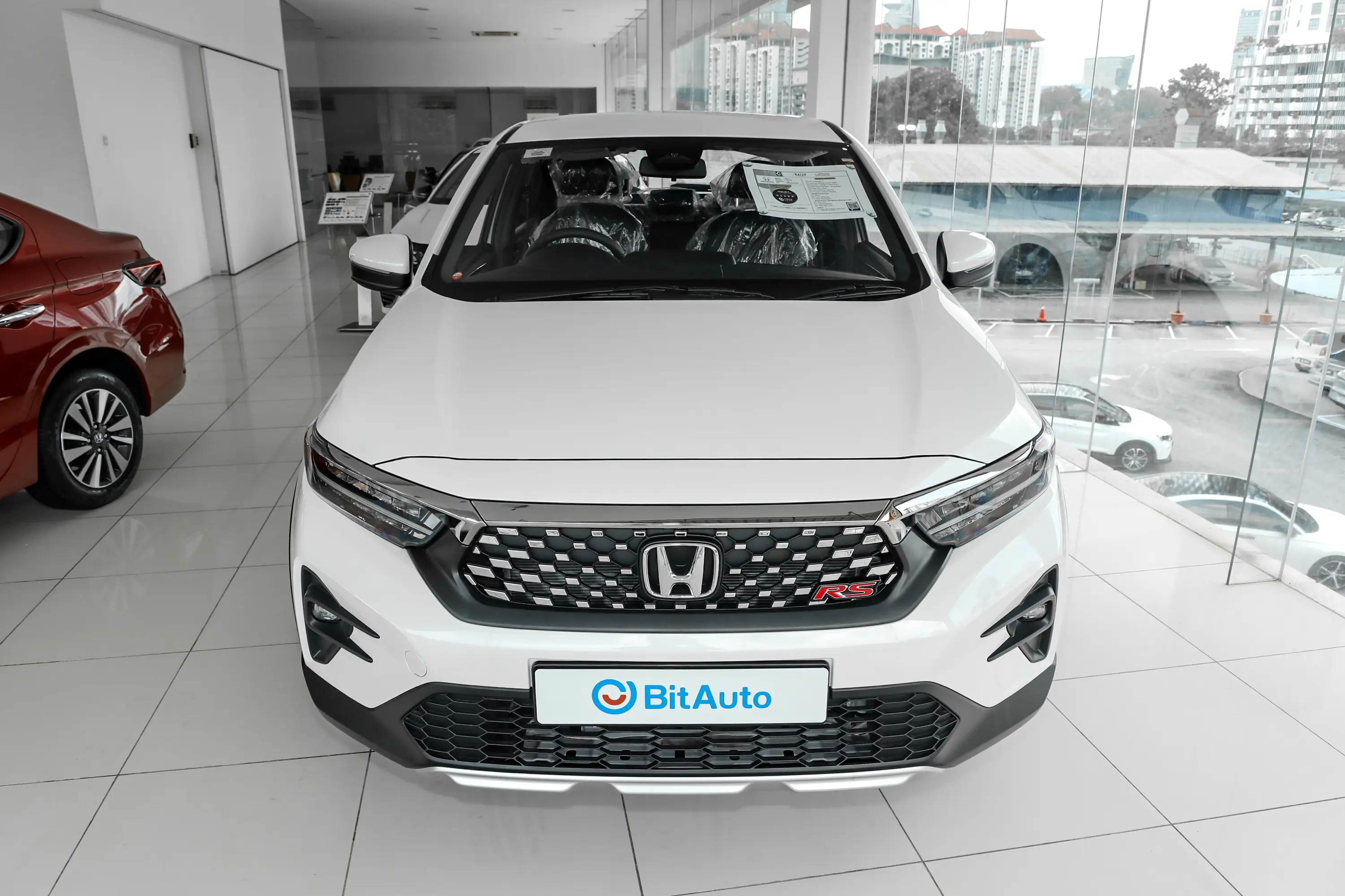 🚗 Just had the opportunity to test drive the Honda WR-V here in Malaysia, and I must say, I'm thoroughly impressed! This vehicle represents a significant step forward for the Malaysian automotive industry.

The driving experience is smooth and refined. The engine responds promptly to acceleration inputs, making overtaking on highways a breeze. The suspension system absorbs road imperfections well, providing a comfortable ride even on Malaysia's occasionally rough roads.

One standout feature of the Honda WR-V is its fuel efficiency. With rising petrol prices in Malaysia, this is a crucial consideration for many buyers. The Honda WR-V delivers impressive mileage, making it an economical choice for daily commuting.

The interior space is generous, with ample legroom for both front and rear passengers. The boot capacity is also practical for family trips or weekend getaways to destinations like Cameron Highlands or Langkawi.

Technology-wise, the Honda WR-V is well-equipped. The touchscreen infotainment system is responsive and user-friendly. Wireless charging, multiple USB ports, and climate control add to the convenience factor.

After spending a week with the Honda WR-V, I can confidently recommend it to anyone looking for a reliable, comfortable, and stylish vehicle in Malaysia. The combination of features, performance, and pricing makes it a compelling option in its segment.

What are your thoughts on the Honda WR-V? Share your opinions in the comments below!

#TestDrive #MalaysiaAutomotive #CarReview