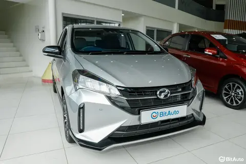 一辆Perodua或Proton,装着的从来不只是人和货